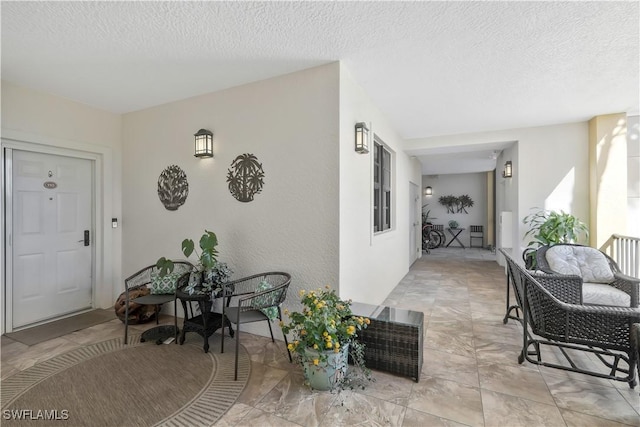 interior space with a textured ceiling