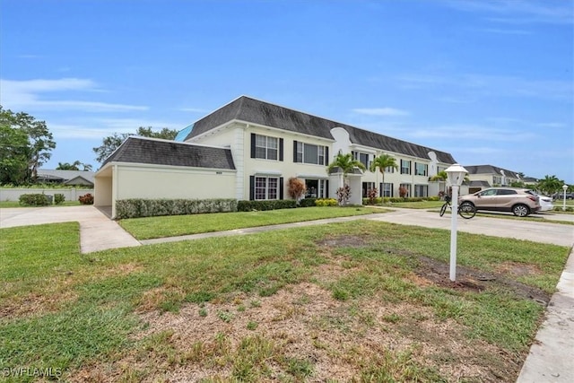 view of front of home with a front yard