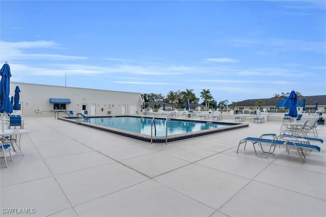 view of pool with a patio area