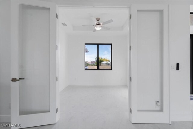 interior space featuring a tray ceiling