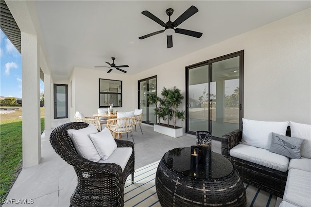 view of patio / terrace with an outdoor living space and ceiling fan