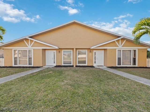 view of front of house with a front lawn