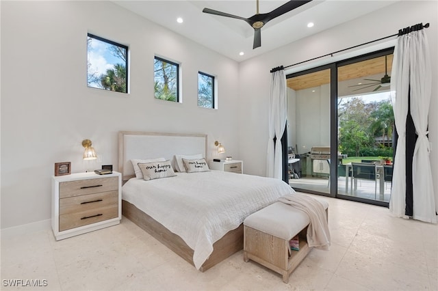 bedroom with ceiling fan, multiple windows, and access to outside