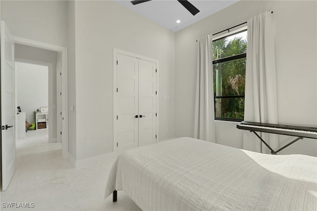 bedroom featuring a closet and ceiling fan