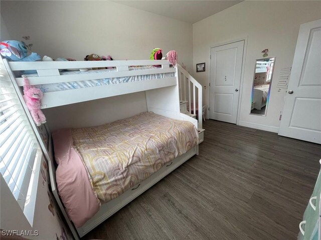 bedroom featuring dark hardwood / wood-style floors