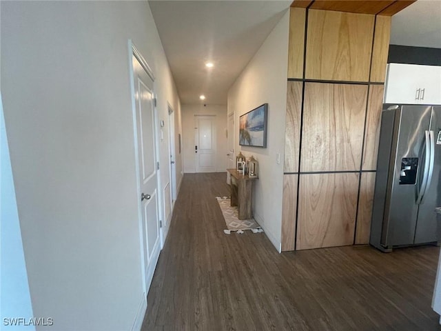 corridor featuring dark wood-type flooring