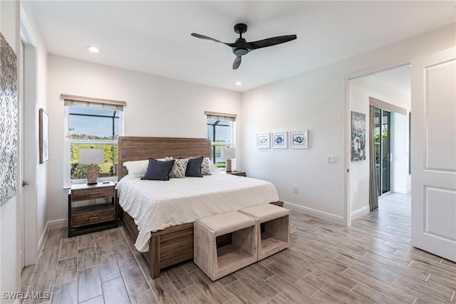 bedroom featuring wood finish floors, ceiling fan, baseboards, and recessed lighting