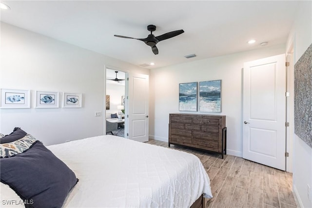 bedroom with recessed lighting, a ceiling fan, baseboards, visible vents, and light wood-type flooring