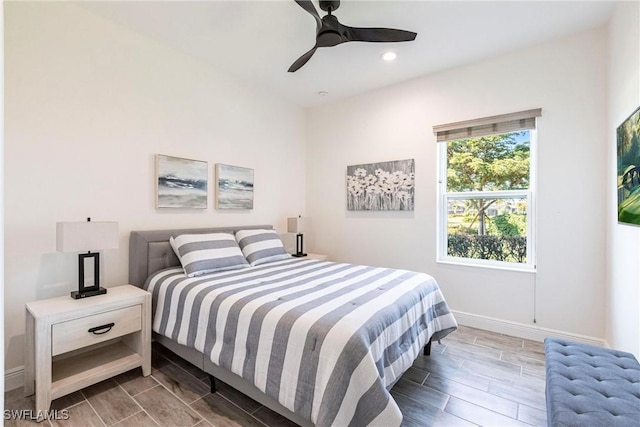 bedroom featuring baseboards, recessed lighting, a ceiling fan, and wood tiled floor