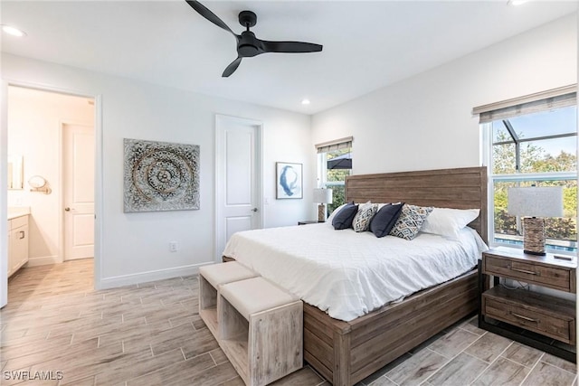 bedroom with ceiling fan and ensuite bathroom