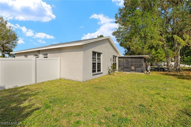 exterior space with a lawn