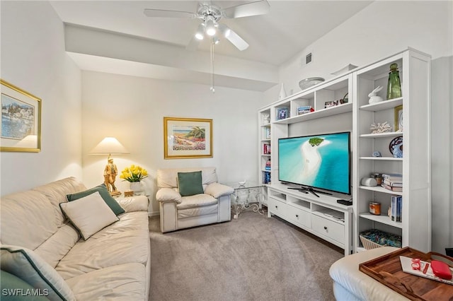 living room featuring light carpet and ceiling fan