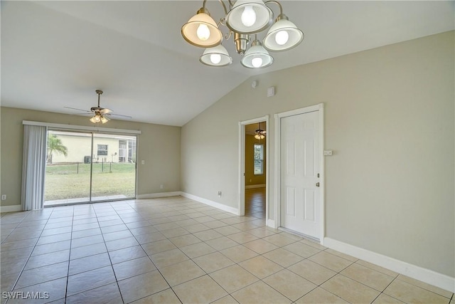 unfurnished room with lofted ceiling, ceiling fan with notable chandelier, and light tile patterned flooring