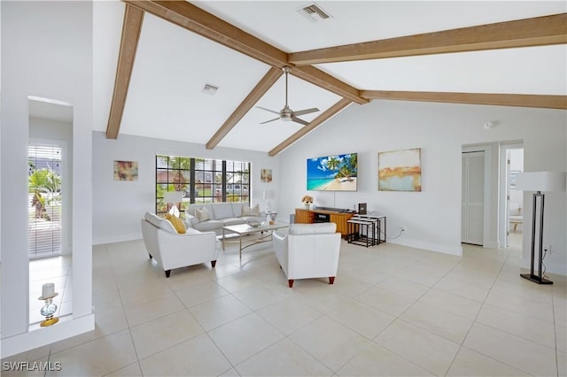 living room with lofted ceiling with beams, light tile patterned floors, and ceiling fan