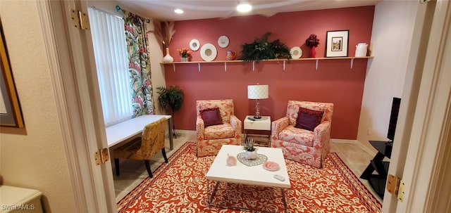 living area featuring light tile patterned flooring