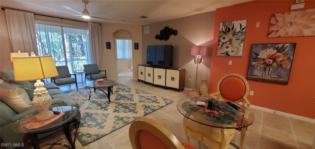 living room with light tile patterned floors