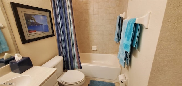 full bathroom featuring vanity, shower / tub combo with curtain, and toilet