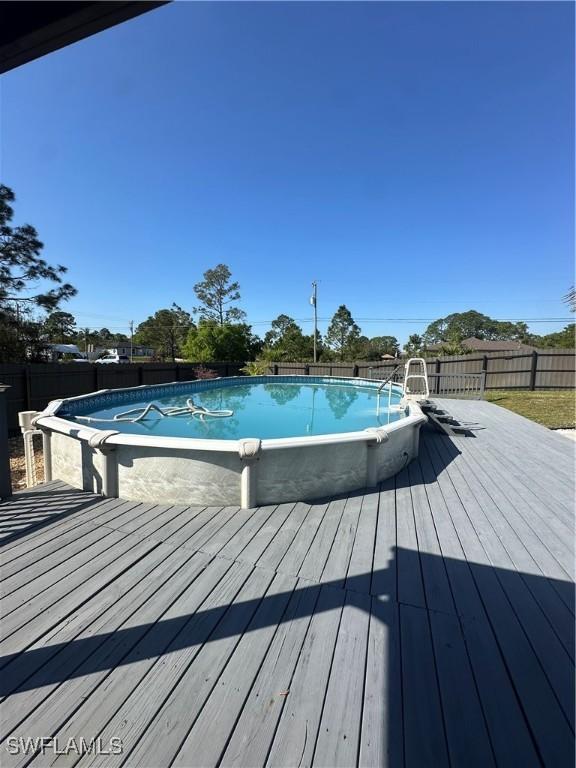 view of pool with a deck