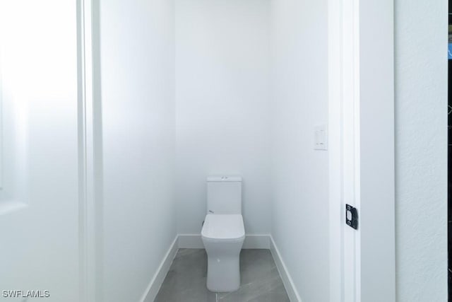 bathroom featuring toilet