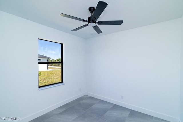 empty room featuring ceiling fan