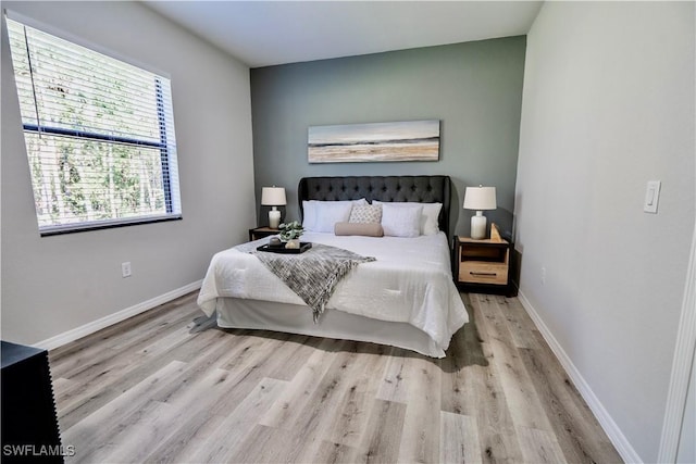 bedroom featuring light hardwood / wood-style flooring