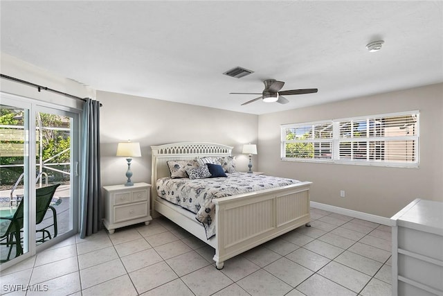 bedroom with multiple windows, light tile patterned floors, access to exterior, and ceiling fan