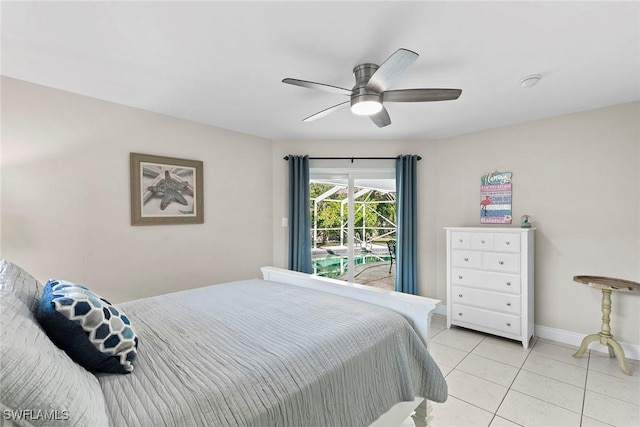 tiled bedroom featuring ceiling fan