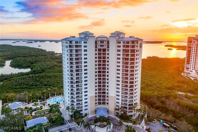 outdoor building at dusk with a water view