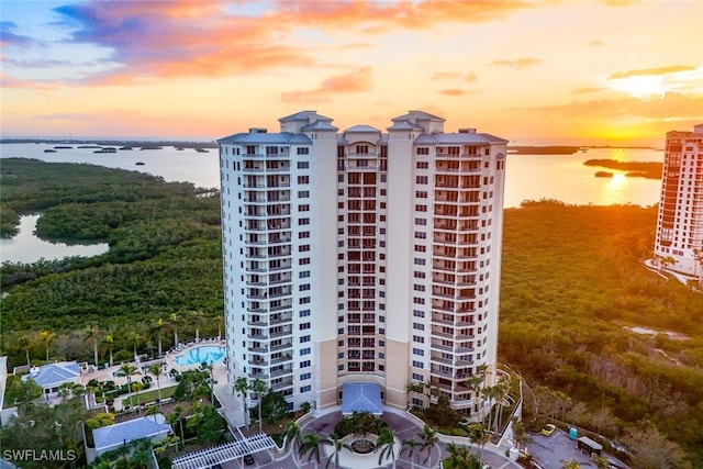 4875 Pelican Colony Blvd Unit 1501, Bonita Springs, FL 34134 - property at dusk featuring a water view