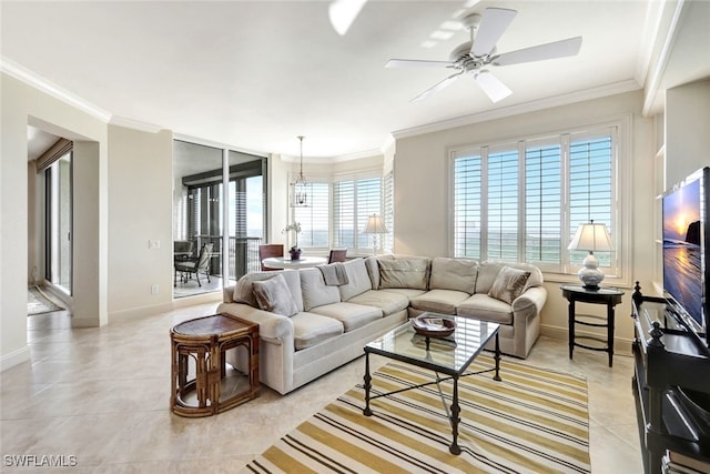 living area featuring light tile patterned floors, a ceiling fan, and ornamental molding
