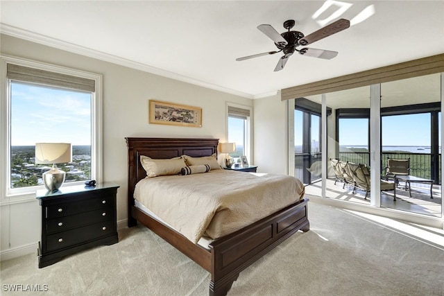 bedroom featuring baseboards, light colored carpet, ornamental molding, a ceiling fan, and access to outside