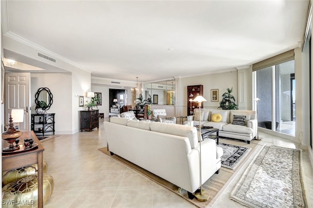living room featuring a wealth of natural light, visible vents, an inviting chandelier, and ornamental molding