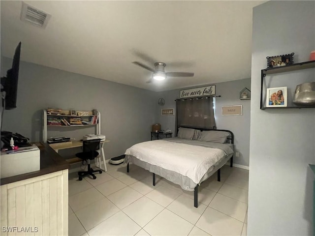 bedroom featuring light tile patterned floors and ceiling fan