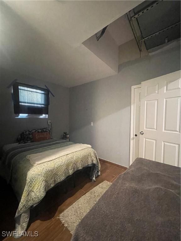 bedroom featuring hardwood / wood-style floors