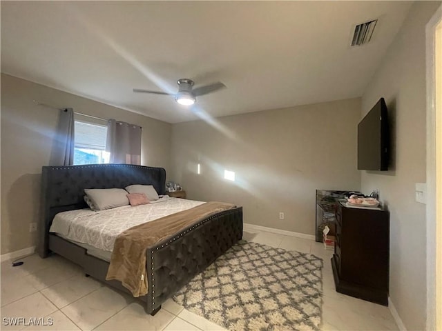 bedroom with light tile patterned floors and ceiling fan