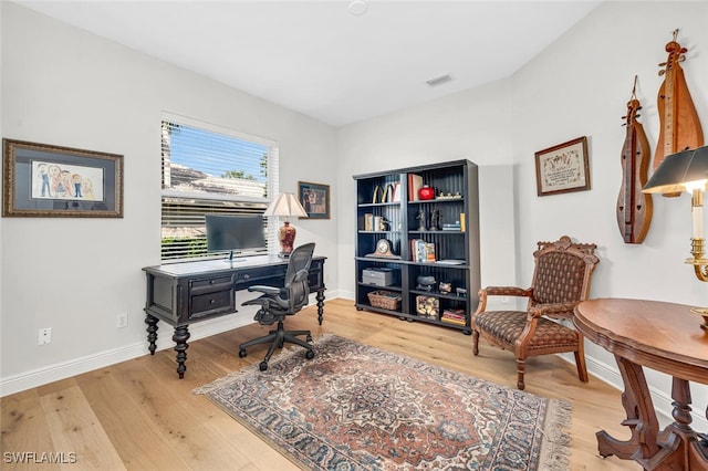 office space featuring light hardwood / wood-style flooring