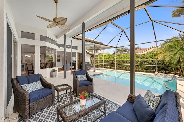 view of swimming pool with area for grilling, outdoor lounge area, a lanai, ceiling fan, and a patio