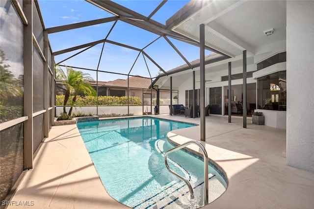 view of swimming pool with a fenced in pool, a patio, and glass enclosure