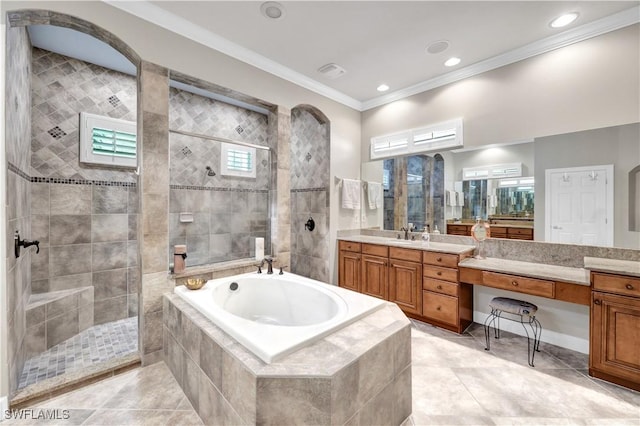 bathroom with tile patterned floors, ornamental molding, independent shower and bath, and vanity