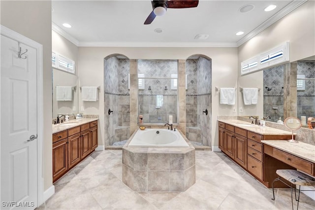 bathroom featuring crown molding, ceiling fan, vanity, and shower with separate bathtub