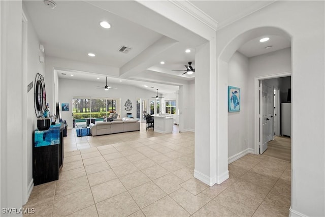 corridor with light tile patterned floors and beam ceiling