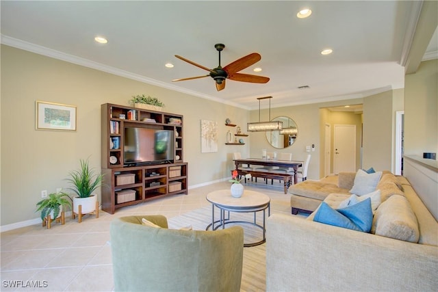 tiled living room with crown molding and ceiling fan