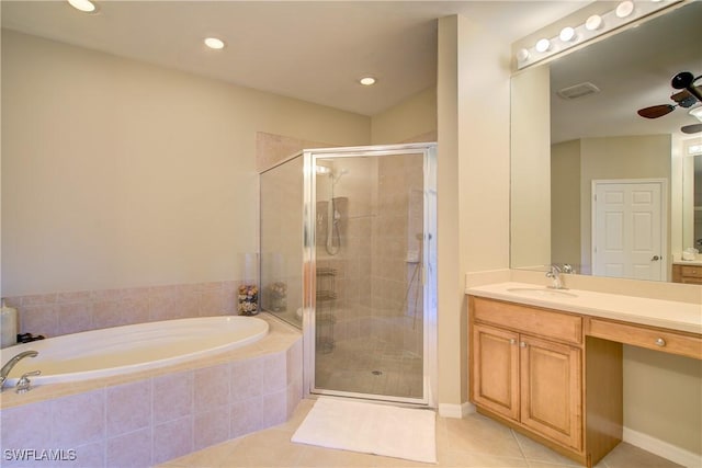 bathroom featuring vanity, separate shower and tub, and tile patterned floors