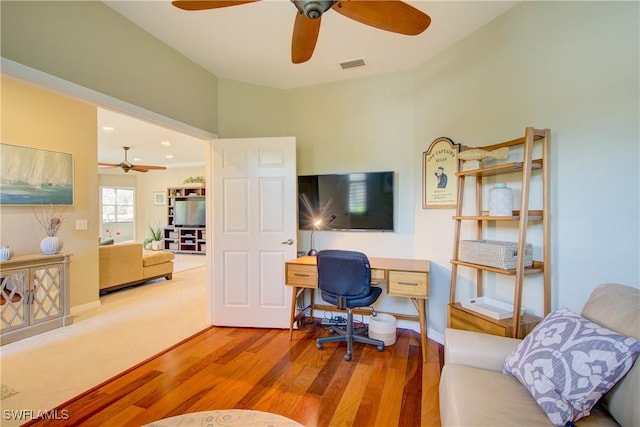 office with hardwood / wood-style flooring