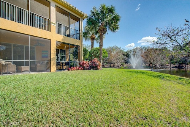 view of yard featuring a water view