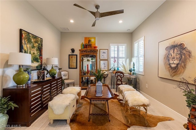 sitting room featuring recessed lighting, visible vents, ceiling fan, and baseboards