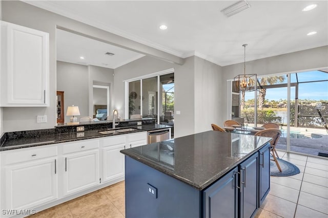 kitchen featuring white cabinetry, sink, and dark stone countertops