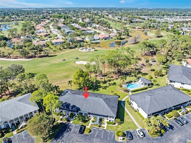 birds eye view of property featuring a residential view and view of golf course