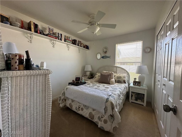 bedroom with carpet floors, ceiling fan, and a closet