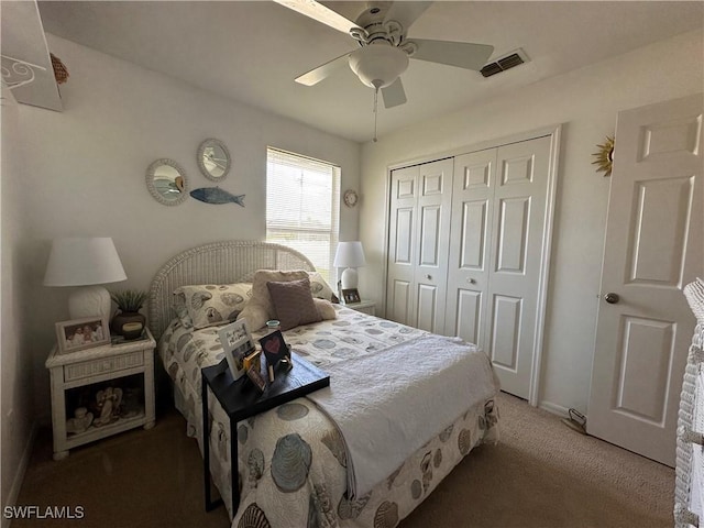 carpeted bedroom featuring ceiling fan and a closet